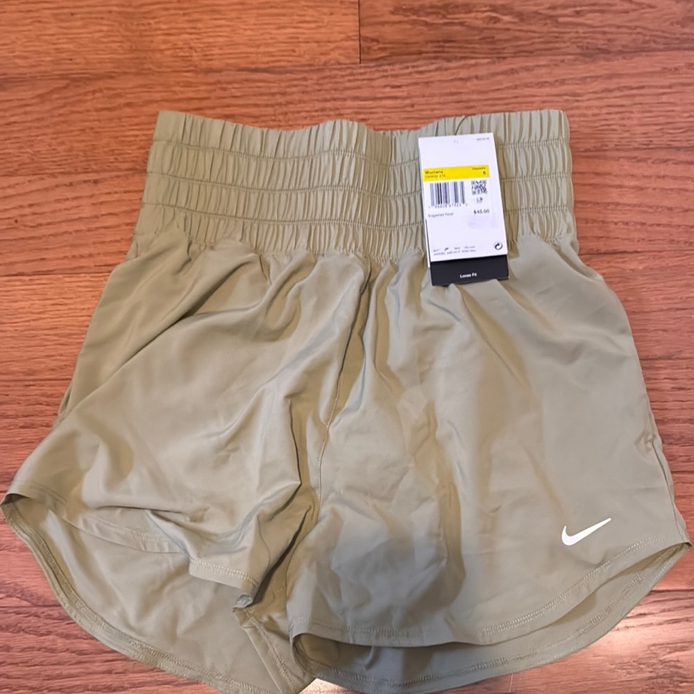 Nike women’s shorts in size small. Light olive green.